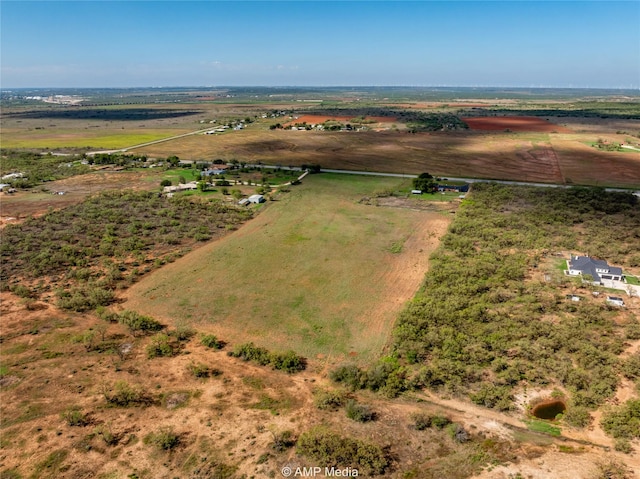 birds eye view of property featuring a rural view