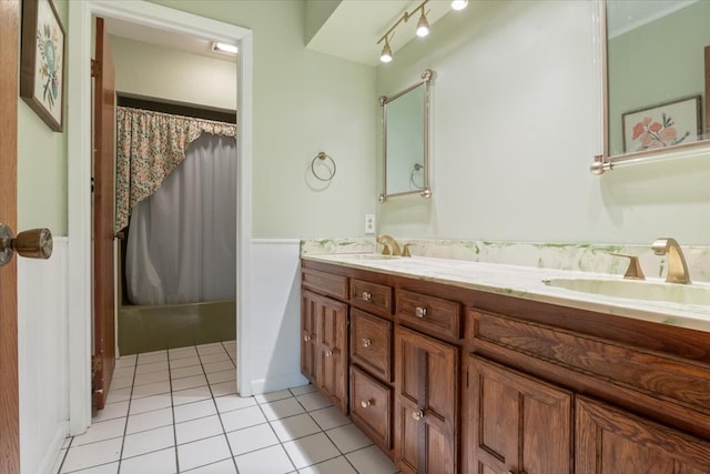 bathroom with tile patterned flooring, vanity, and a shower with shower curtain