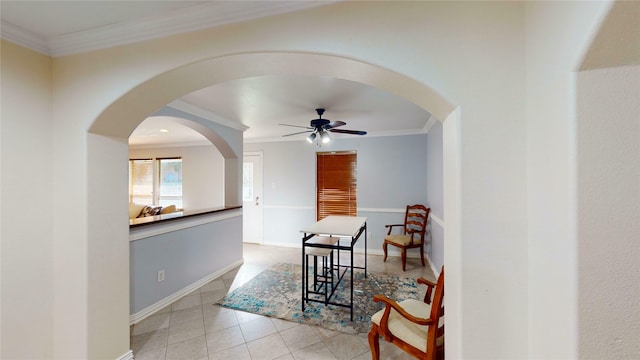 hallway featuring ornamental molding and light tile patterned floors