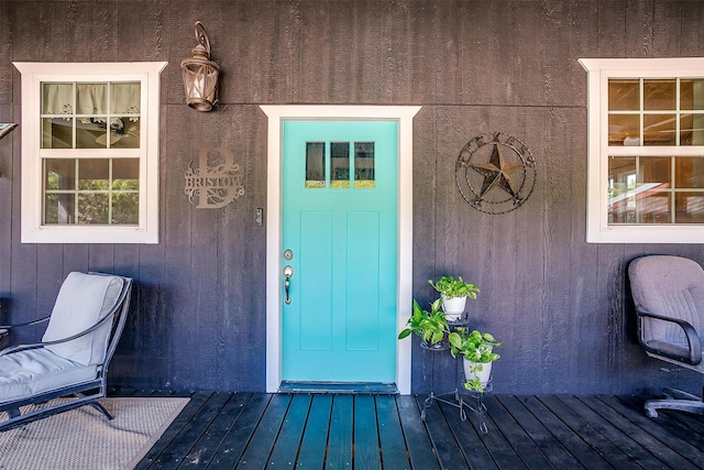 doorway to property featuring a deck