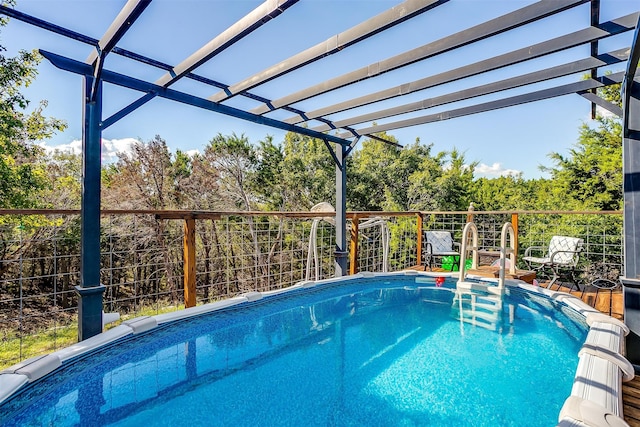 outdoor pool featuring a pergola