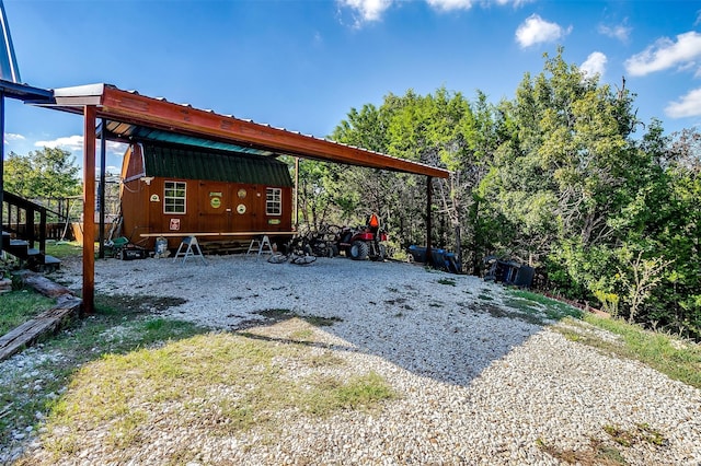 exterior space featuring an outbuilding