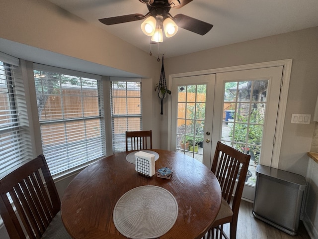 dining space with light hardwood / wood-style flooring, ceiling fan, and french doors