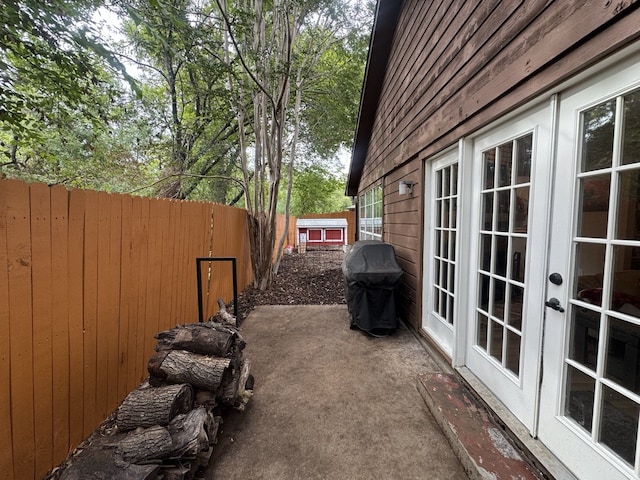 exterior space with french doors and a patio area