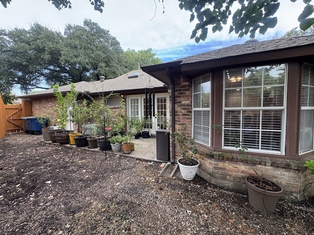 back of house with a patio