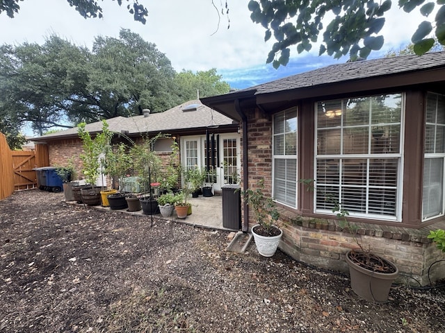 back of property featuring a patio area