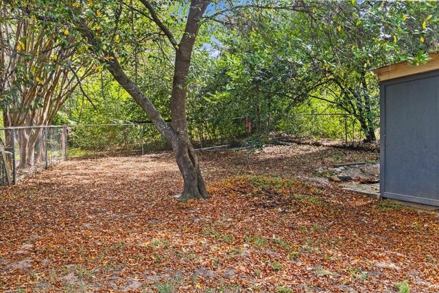 315 Highlander Hts, Hideaway, TX 75771 - view of yard with a fenced backyard