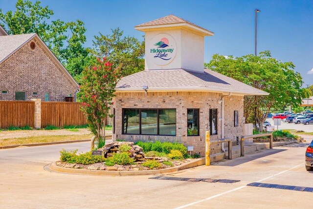 315 Highlander Hts, Hideaway, TX 75771 - view of property's community featuring fence