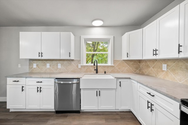 kitchen with stainless steel dishwasher, white cabinets, backsplash, a sink, and dark wood-type flooring