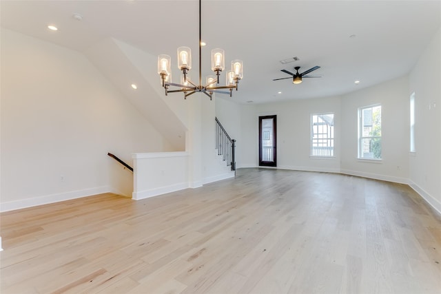 unfurnished living room with light wood finished floors, visible vents, and recessed lighting