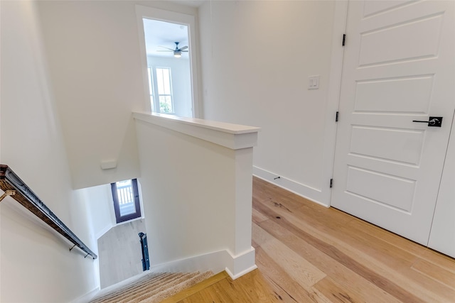 entryway featuring light wood-type flooring and baseboards