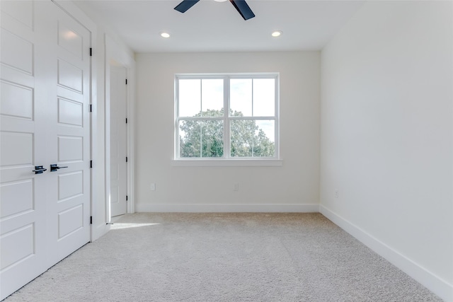 unfurnished room featuring carpet floors, recessed lighting, baseboards, and a ceiling fan