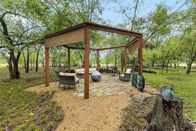 view of yard with outdoor lounge area and a patio