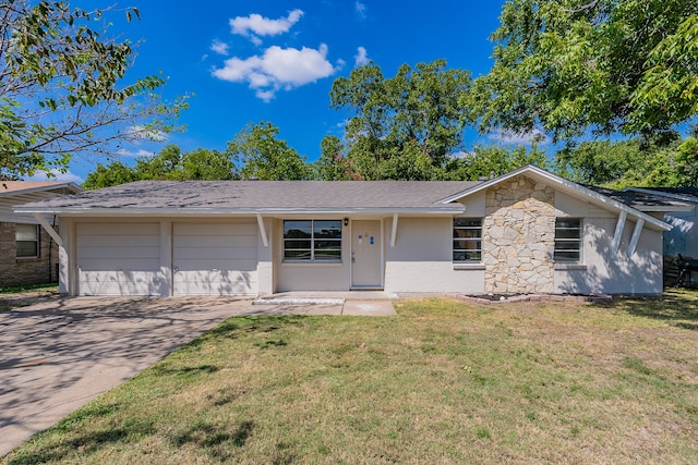 ranch-style house with a garage and a front yard