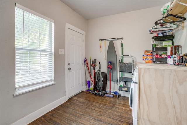 foyer with dark hardwood / wood-style floors