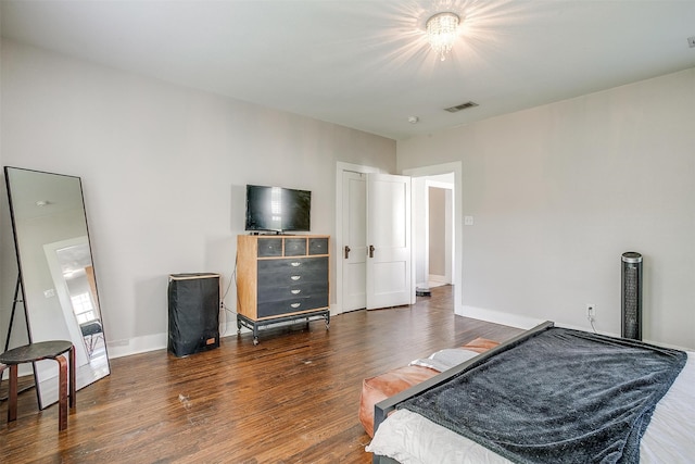 bedroom featuring dark wood-type flooring