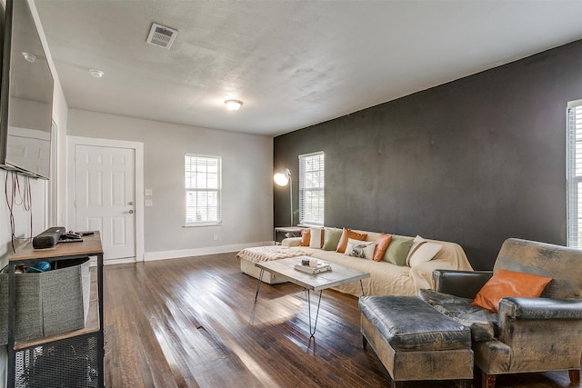 living room featuring dark hardwood / wood-style floors