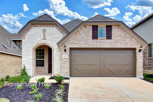 view of front of home with a garage