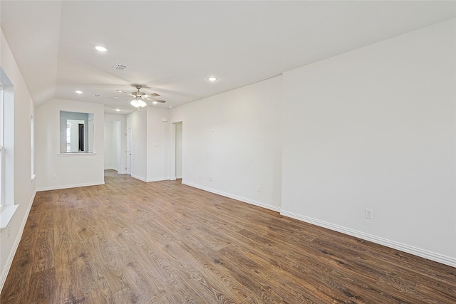 unfurnished living room with wood-type flooring and ceiling fan