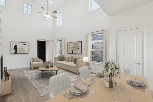 3913 Sky Dr, Sherman, TX 75090 - living area featuring wood finished floors, a high ceiling, ceiling fan, and baseboards
