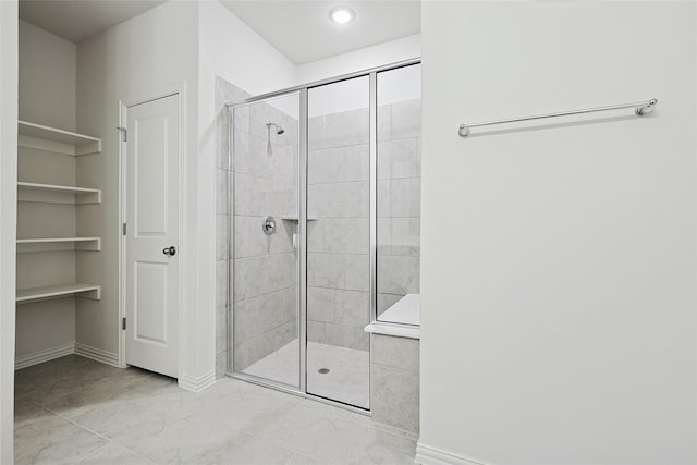 3913 Sky Dr, Sherman, TX 75090 - bathroom featuring a shower stall, baseboards, and recessed lighting