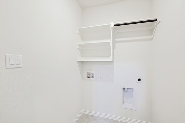 3913 Sky Dr, Sherman, TX 75090 - laundry area with hookup for a washing machine, electric dryer hookup, baseboards, and hookup for a gas dryer