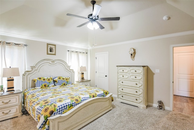 bedroom featuring lofted ceiling, ornamental molding, ceiling fan, and light colored carpet