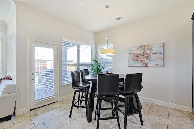 dining room with light tile patterned floors