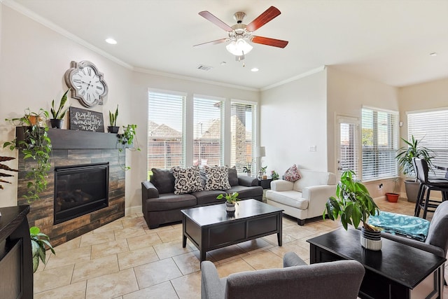 living room featuring crown molding and ceiling fan