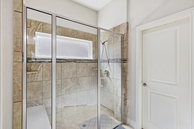 bathroom featuring an enclosed shower