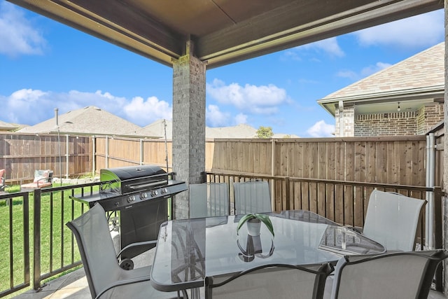 view of patio with a grill