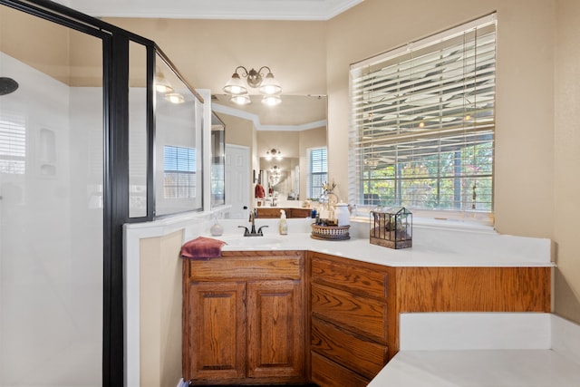 bathroom featuring ornamental molding, a shower, and vanity