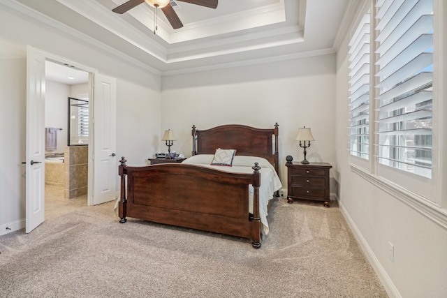 bedroom with connected bathroom, ceiling fan, crown molding, and light colored carpet