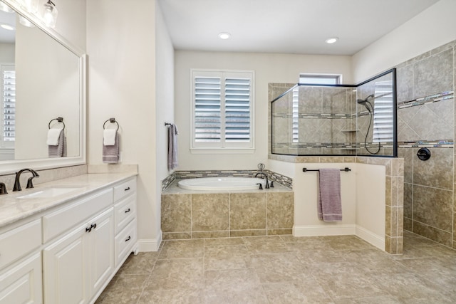 bathroom with vanity, tile patterned floors, and independent shower and bath