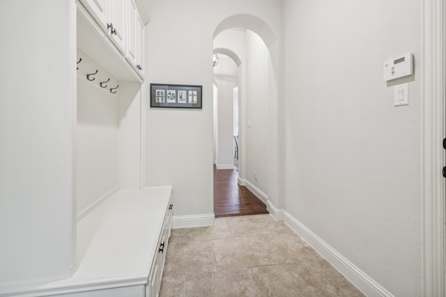 mudroom with light tile patterned floors