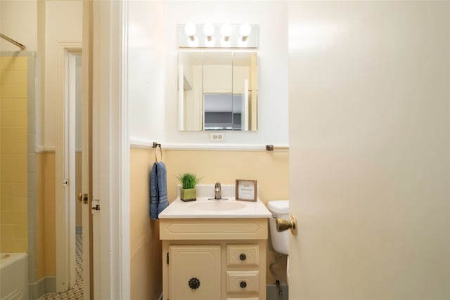 bathroom with shower / tub combination and vanity