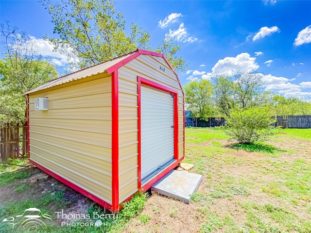 view of outdoor structure with a yard