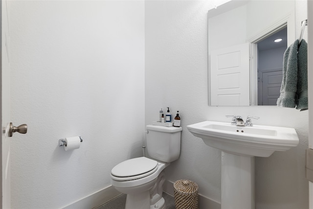 bathroom featuring toilet