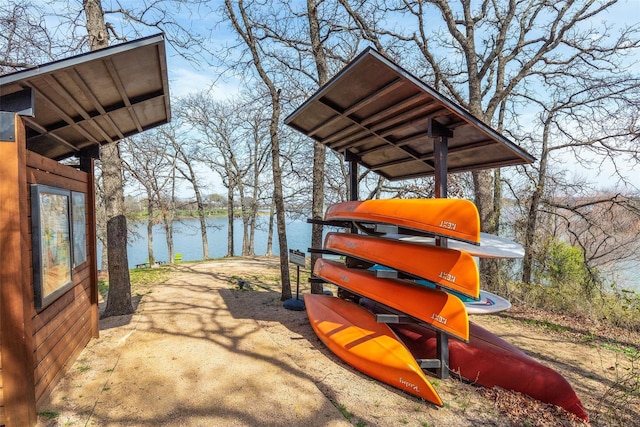 exterior space with a water view