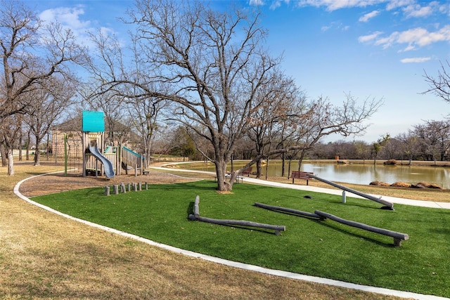 exterior space featuring a water view and a yard