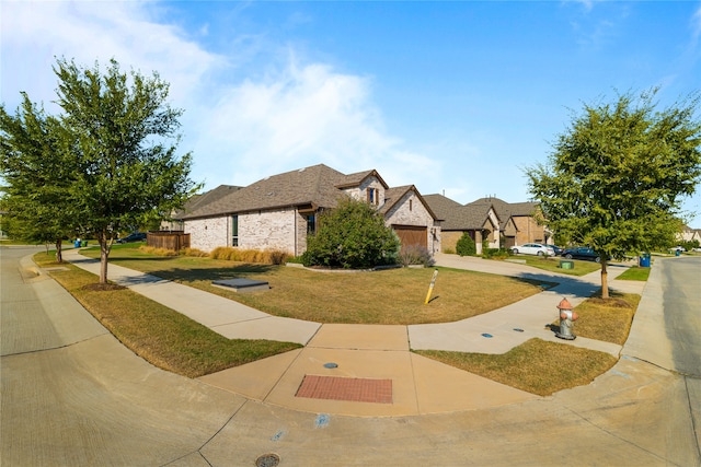 view of front of home with a front lawn