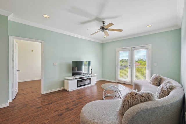 living room with dark hardwood / wood-style floors, ceiling fan, ornamental molding, and french doors