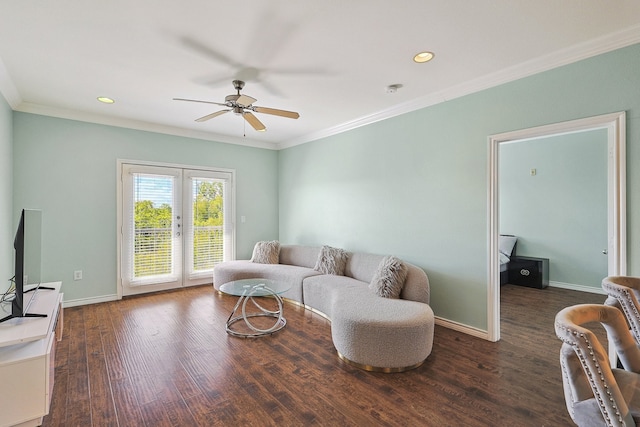 living room with ornamental molding, french doors, dark wood-type flooring, and ceiling fan