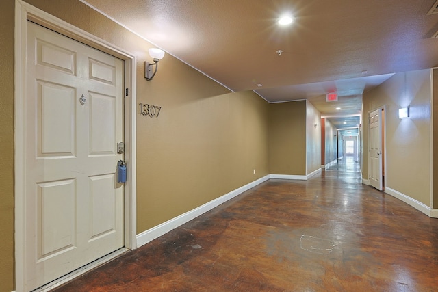 interior space featuring a textured ceiling