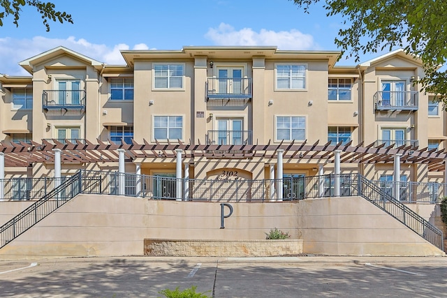 exterior space featuring a pergola