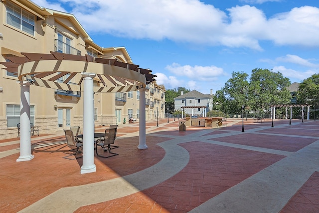 view of community featuring a pergola