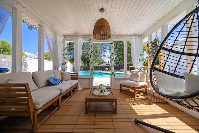 sunroom / solarium with wood ceiling