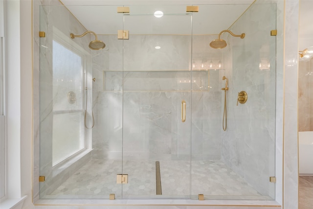 bathroom with an enclosed shower