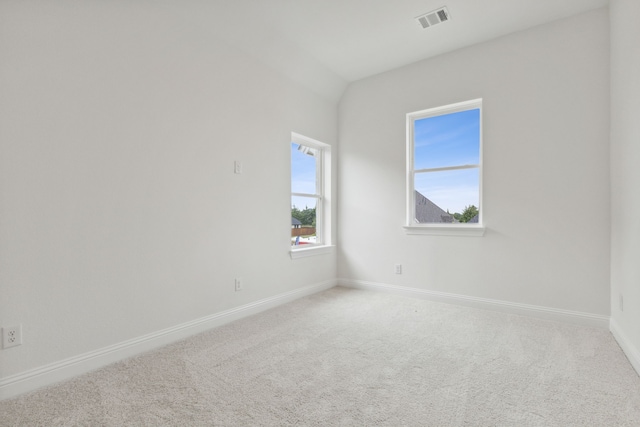 spare room featuring carpet flooring