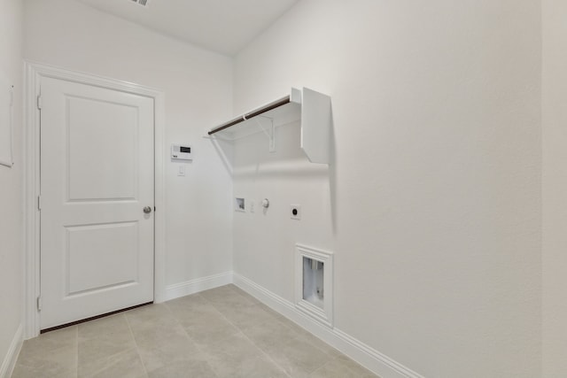 laundry area featuring electric dryer hookup, hookup for a gas dryer, and washer hookup